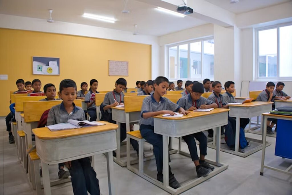 Kids studying on desks with books and notebooks in front of them