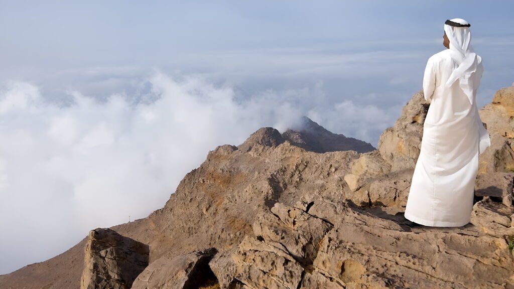 Tourists enjoying Ras Al Khaimah in October, exploring mountain sites under perfect fall weather